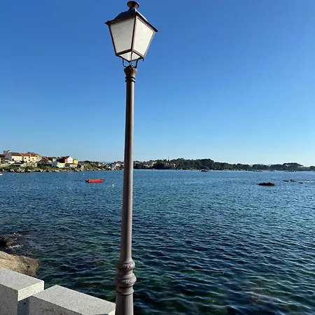 Apartamento Paseo Maritimo,a Salga 艾利亚德亚罗萨